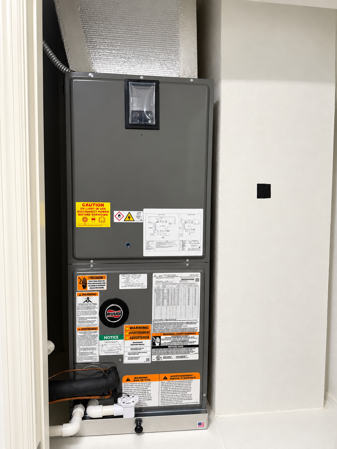Closet air handler with UV light